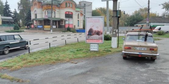 Фото рекламной плоскости по адресу ул. Первомайская, возле д. № 63/16 возле ЖД вокзала в сторону амстора