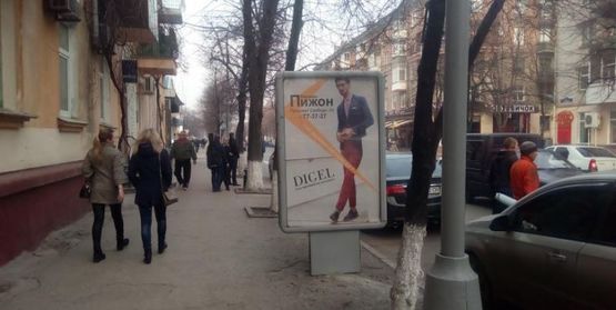 Фото рекламной плоскости по адресу ул. Соборная (Ленина), район д. № 5/9, направление - площадь Победы