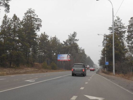 Фото рекламной плоскости по адресу Конча-Заспа, траса Р-02, км 29+700 право, навпроти супермаркету "FAVORE", АЗС "БРСМ"