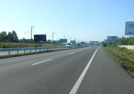 Фото рекламной плоскости по адресу Дніпровське шосе, 1 км після поворота на с.Лісники, траса Н-01 "Київ-Знам'янка", км 21+850 ліво