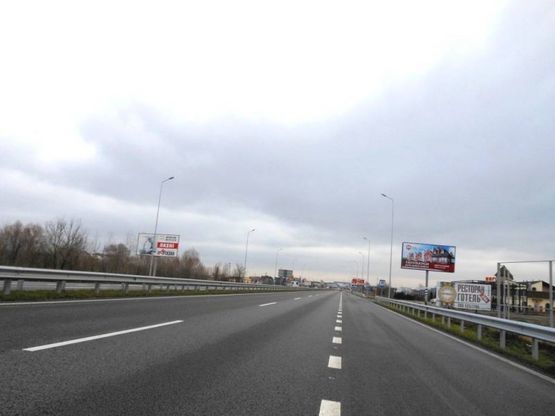 Фото рекламної площини за адресою Новообухівська траса, возле ресторана "Танжер", км 25+700 праворуч