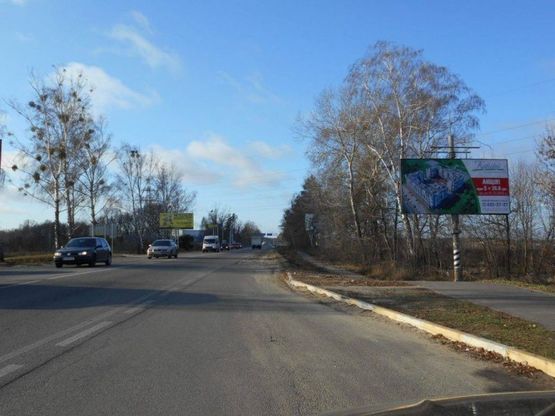 Фото рекламної площини за адресою м.Буча, траса М07, км 30+150 право,  вул. Нове Шосе- вул. Депутатська, за ТЦ Модуль, навпроти ТК Варшавський, ЖК "Буча-Квартал"