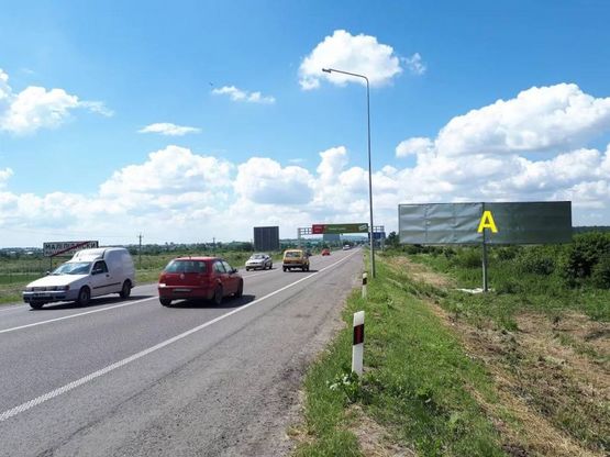 Фото рекламної площини за адресою Об'їзна М-06, Київ-Чоп, на виїзді з с.Малі Підліски в сторону Львова