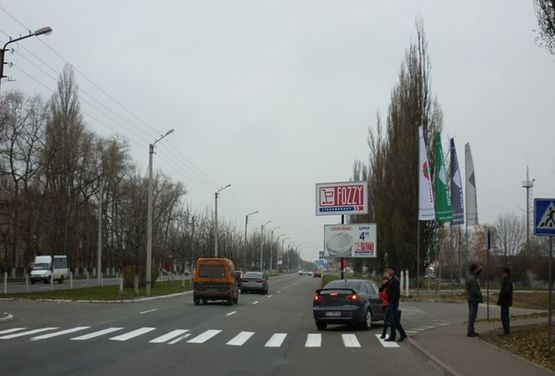 Фото рекламной плоскости по адресу ул. Киевская, 66 -Г