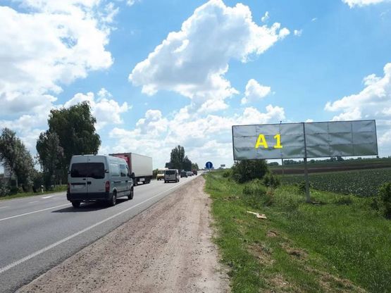 Фото рекламної площини за адресою Обїздна М-06, Київ-Чоп, перед виїздом на трасу Н-17 поворот на Гамалієвку в сторону Винник (лівий)
