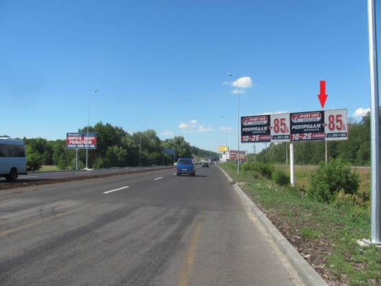 Фото рекламной плоскости по адресу Новообуховская трасса (Днепропетровское шоссе), в направлении г. Киев, 2,5 км. после ТЦ"Мегамаркет", 500м. до поворота на с. Лесники, 5км+500метров, правая