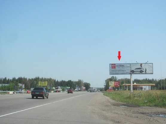 Фото рекламной плоскости по адресу Одесская трасса, в направлении г.Киев, перед заправкой Shell,8км+900метров, левая