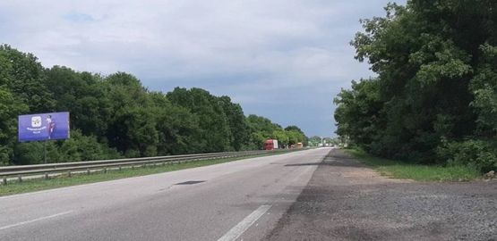 Фото рекламной плоскости по адресу Киев-Харьков км 465+550 в Харьков 7 км