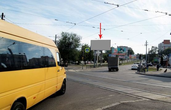 Фото рекламной плоскости по адресу s070А,вул. Робоча - вул. В. Антоновича (Свердлова), світлофор, маг. АТБ