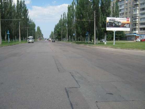 Фото рекламной плоскости по адресу 30-річчя Перемоги вул., 22 - Олени Теліги вул. (Конєва вул.)