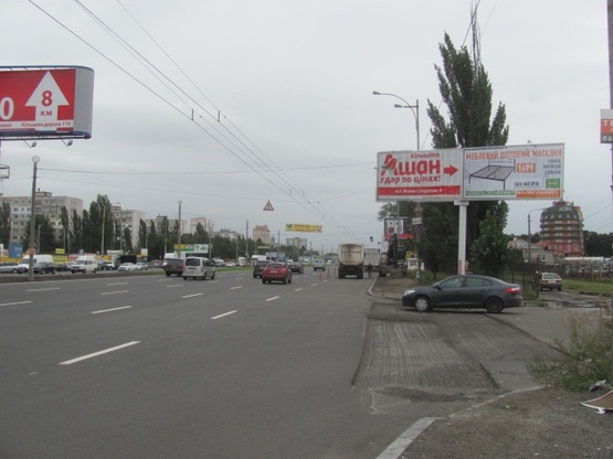 Фото рекламной плоскости по адресу Кольцевая дорога - поворот к ТЦ "АШАН" (магазин "Технополис", в направлении Софиевской Борщаговки)
