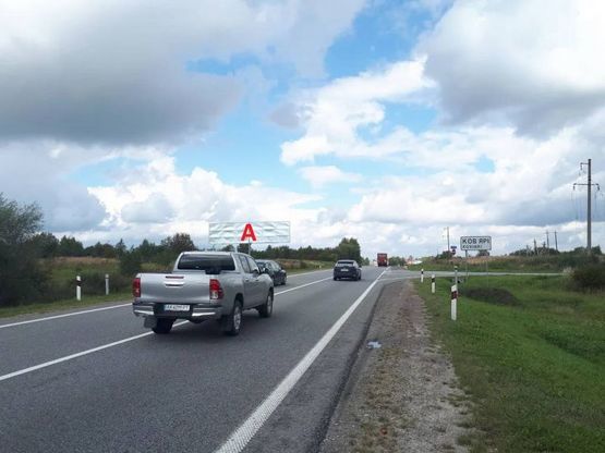 Фото рекламної площини за адресою Обїздна М-06, Київ-Чоп, в напрямку в'їзду до Львова, перед вїздом с. Ков'ярі, перед АЗС WOG
