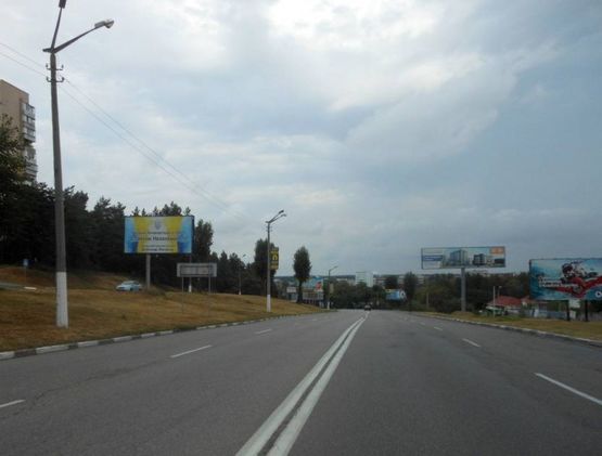 Фото рекламной плоскости по адресу м. Обухів, вул.. Київська, 121  (виїзд з Обухів на Київ, Українку)