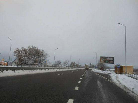 Фото рекламной плоскости по адресу с. Таценки, міст через р. Стугна, в'їзд в Обухів