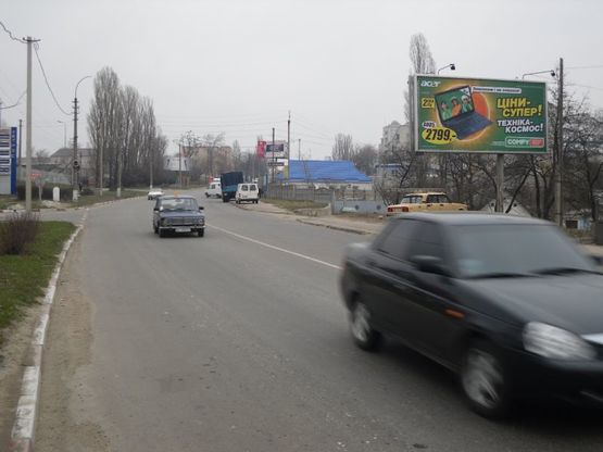 Фото рекламной плоскости по адресу Вул. Київська напроти АЗС "Лукойл" (виїзд з міста)