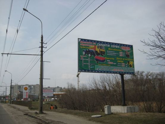 Фото рекламной плоскости по адресу П-т К. Володимира, міст через р.Протока (в центр)