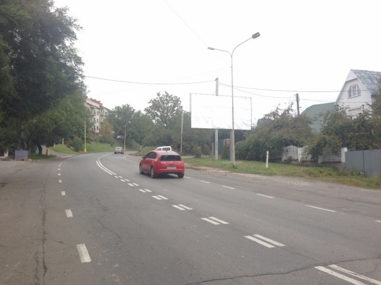 Фото рекламной плоскости по адресу м. Ужгород, вул. Собранецька, 180, в сторону Словацького кордону, біля АЗС Мотто