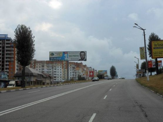 Фото рекламной плоскости по адресу м. Обухів, вул. Київська,168, біля ринку "Піщаний" та житлового комплексу "Нектарний"