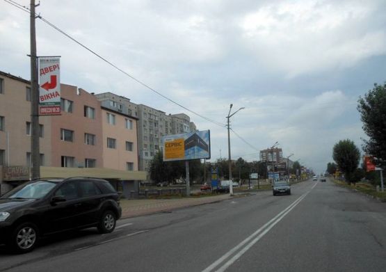 Фото рекламной плоскости по адресу м. Обухів, вул.Київська, 113-А, біля банку "Аваль"