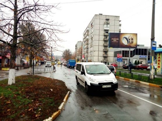 Фото рекламной плоскости по адресу м. Обухів, вул.. Каштанова, 9 , навпроти ринку "Ранковий", біля СТО