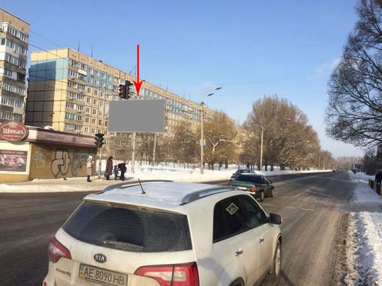Фото рекламной плоскости по адресу 116Б,вул. Метробудівників 5 (перед АТБ), біля світлофору