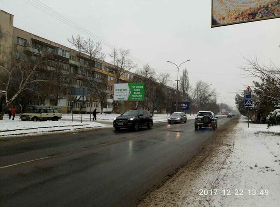 Фото рекламной плоскости по адресу м. Ужгород вул.Грушевського - Заньковецької (в сторону Минайської)