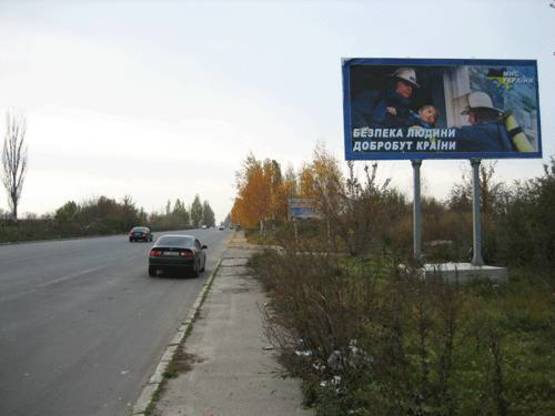 Фото рекламной плоскости по адресу Вул. Сухоярська поряд з заводом "Эталон"