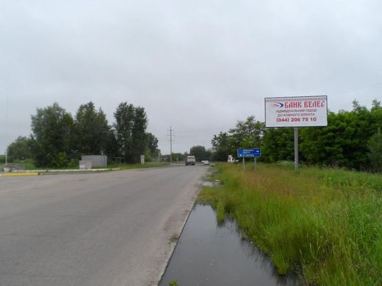 Фото рекламной плоскости по адресу перекресток Окружной и ул. Червоный шлях, напротив бензо-заправки, к выезду на Белую Церковь