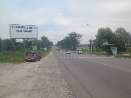 Фото рекламної площини за адресою траса КиЇв - Бишів Лука, перехрестя, зупинка