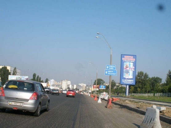 Фото рекламної площини за адресою Бажана проспект / Харьковская площадь (возле АЗС"ВР")