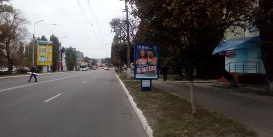 Фото рекламной плоскости по адресу ул.Халаменюка, угол дома №10 (в сторону рынка)