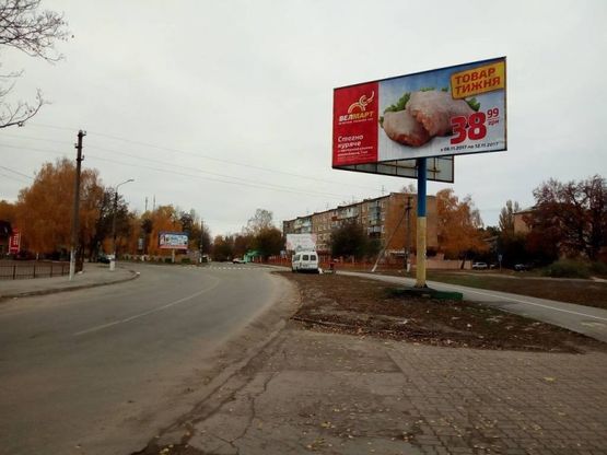 Фото рекламной плоскости по адресу м. Обухів, вул.. Каштанова, 22 (біля монастиря)