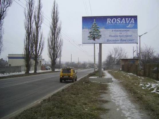 Фото рекламной плоскости по адресу Вул. Дружби (автостоянка)