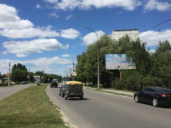 Фото рекламной плоскости по адресу вул. Кн.Володимира,3 (напрямок в центр) + 400 грн поклейка