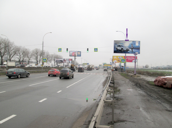 Фото рекламної площини за адресою Кольцевая дорога, ул. Трублаини, автосалон " Скания" (светофор) направление Одесской пл.