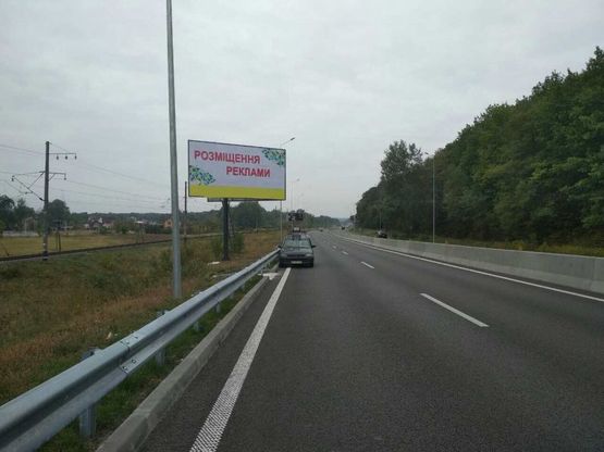 Фото рекламной плоскости по адресу Новообухівська траса (2 до Києва в напрямку м.Обухів)