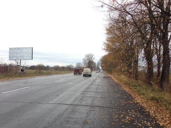 Фото рекламной плоскости по адресу Виїзд з м. Виноградово, в сторону с. Вілок, поворот на с. Фанчиково