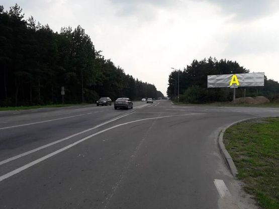 Фото рекламной плоскости по адресу М-10 Західний обхід м. Львова, навпроти Fujikra та АЗС ОККО рух в напрямку с. Рудно та м. Львів