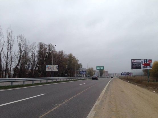 Фото рекламної площини за адресою Дніпровське шосе, перед Мега Маркетом, напротив центра "Аракс-Ходесеевка", "Киев-Обухов", км 24+100 право