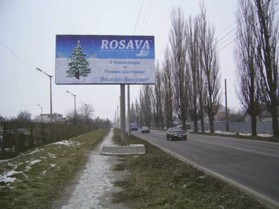 Фото рекламной плоскости по адресу Вул. Дружби (автостоянка)