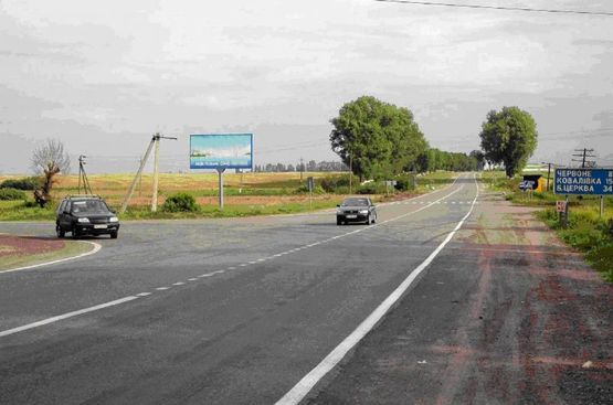Фото рекламной плоскости по адресу ул. Червоный шлях перекресток с  Окружной, перед газо-заправкой, выезд на Белую Церковь, Умань