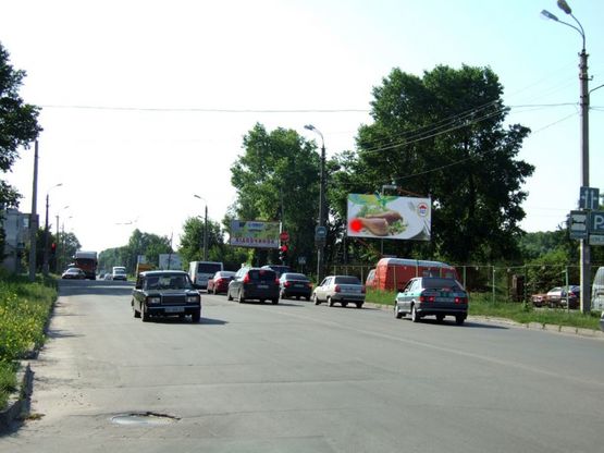 Фото рекламної площини за адресою перехрестя вул.Прибузька - Старокостянтинівське шосе (стоянка). неподалік: автостоянка, шиномонтаж, АЗК, супермаркет "Вопак", непродовольчий ринок (в центр)