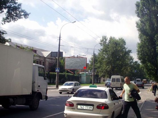 Фото рекламной плоскости по адресу вул.Кам'янецька - вул.Тернопільська. неподалік: університет, бібліотека, супермаркет "Фуршет", автостанція, зупинка (від центру)