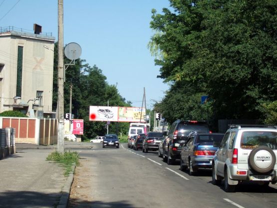 Фото рекламної площини за адресою Т-подібне перехрестя вул.Пушкіна - вул.І.Франка. неподалік: З/Д переїзд, парк, центр міста (центр) [ліве вухо]