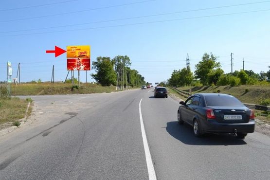 Фото рекламной плоскости по адресу Дергачи-ул. Железнодорожная возле фабрики "Амкор"-верх