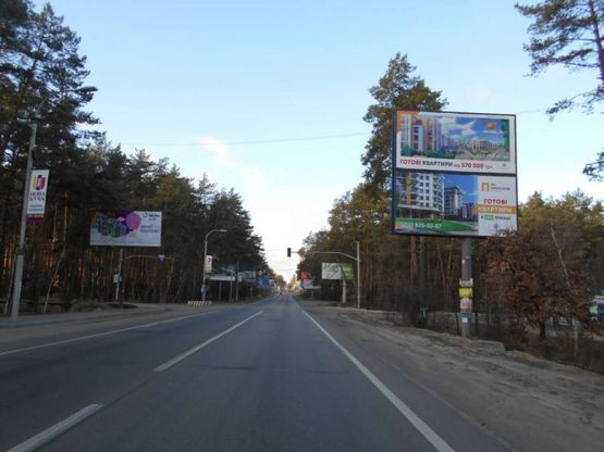 Фото рекламной плоскости по адресу м. Буча, траса М07, км 25+300 право, вул. Шевченка,  на перехресті (світлофор), заїзд  до ЖК "Парк Таун" , ЖК "На Прорізній"
