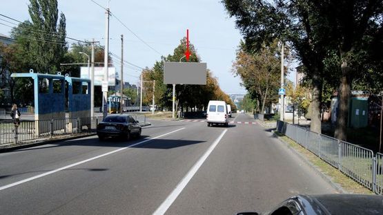 Фото рекламной плоскости по адресу s067А,вул. Робоча, 23-Б - вул.Ньютона (навпроти школи), на світлофорі