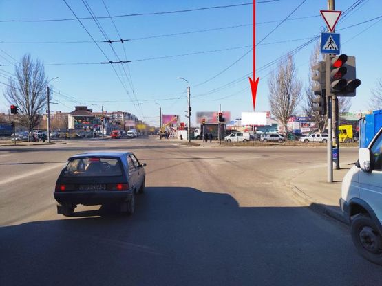 Фото рекламної площини за адресою s089А,вул. Донецьке шосе - вул. Березинська, перехрестя, ТРЦ "Караван", ринок, біля світлофора