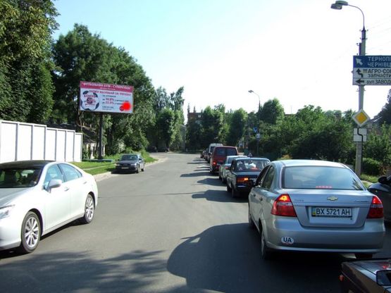 Фото рекламної площини за адресою перехрестя вул.Трудова - вул.Заводська. неподалік: АЗК, автосалон+СТО "Skoda, VW, Honda, Fiat", СТО, ресторан "Sobkoff" (від центру)