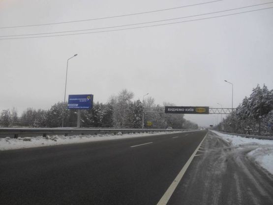 Фото рекламной плоскости по адресу За с.Таценки, перед м.Обухів; 41км+480 праворуч(Н-01 Київ-Знамянка)